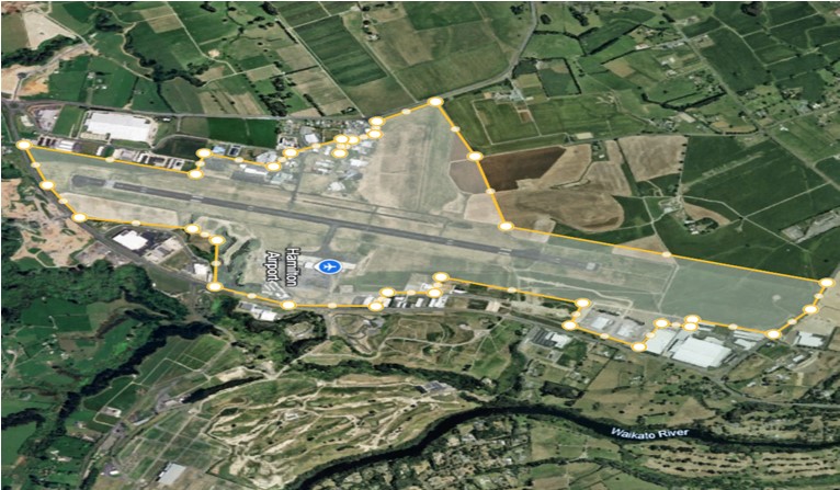 Aerial view of Hamilton International Airport and surrounding area, with ICA boundary outlined in yellow