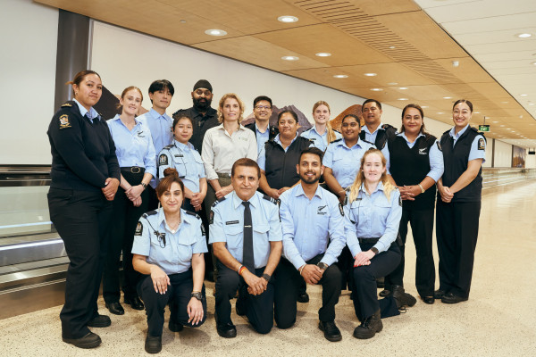 Image of Immigration workers at a New Zealand airport.
