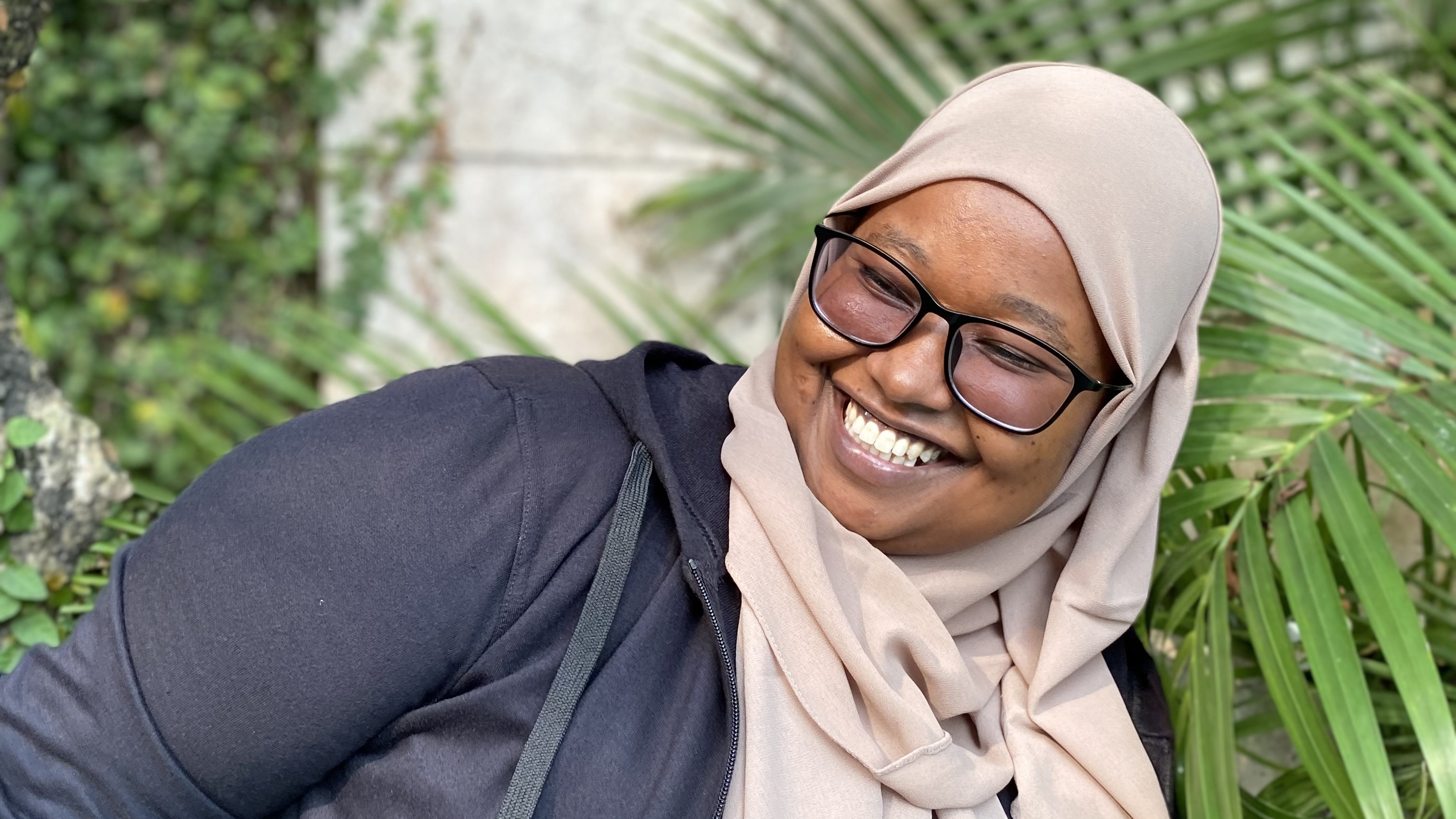 Photo of Nimo Ahmed smiling
