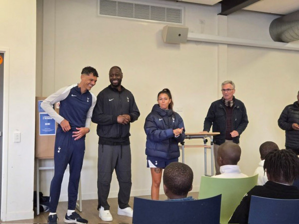 Tyler Blackwood, Ledley King, Shannon Moloney from Tottenham speaking at the refugee centre.