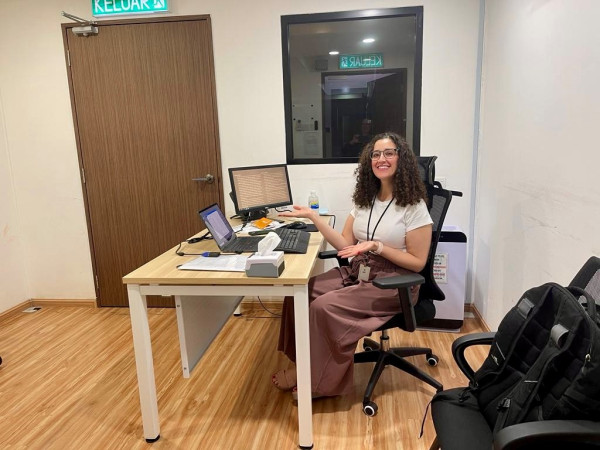 Shahen sitting at desk